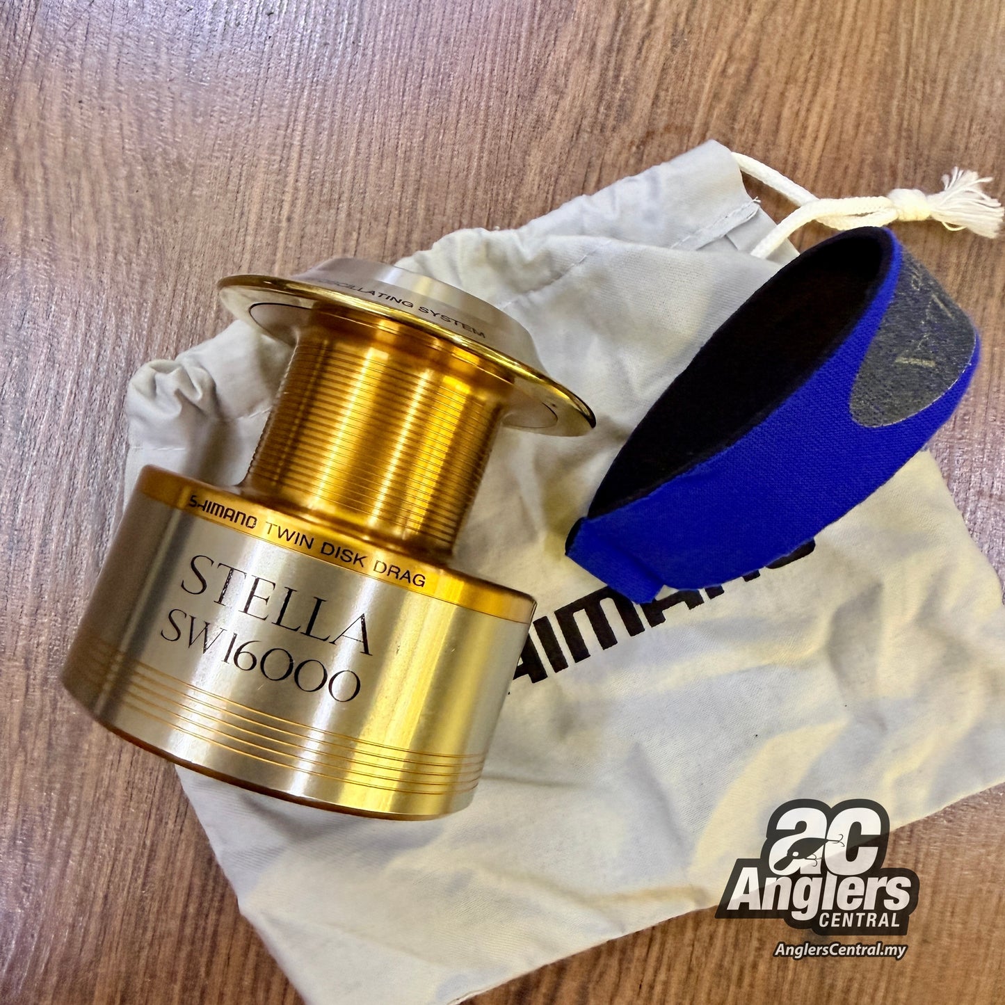 01 Stella SW 16000 spool (USED, 8.5/10) with spool band/pouch